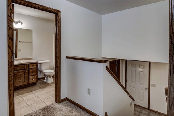 Main Floor Bathroom & Lower Level Stairs